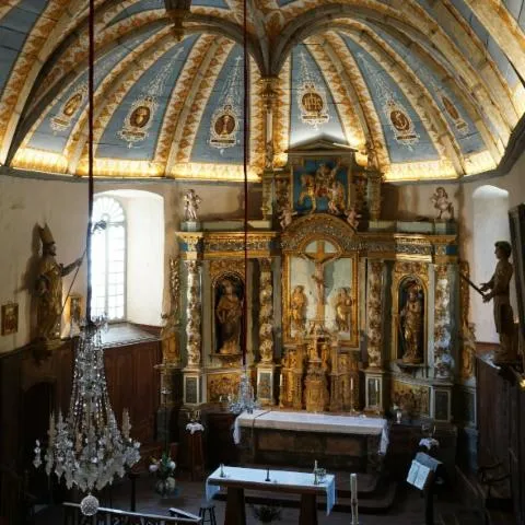 Image qui illustre: Découvrez une église classée au titre des Monuments Historiques et son retable également classé, œuvre de Marc Ferrère