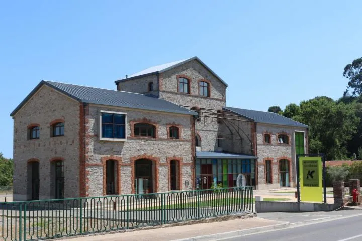 Image qui illustre: Ancienne usine gallique aujourd'hui médiathèque de Folelli