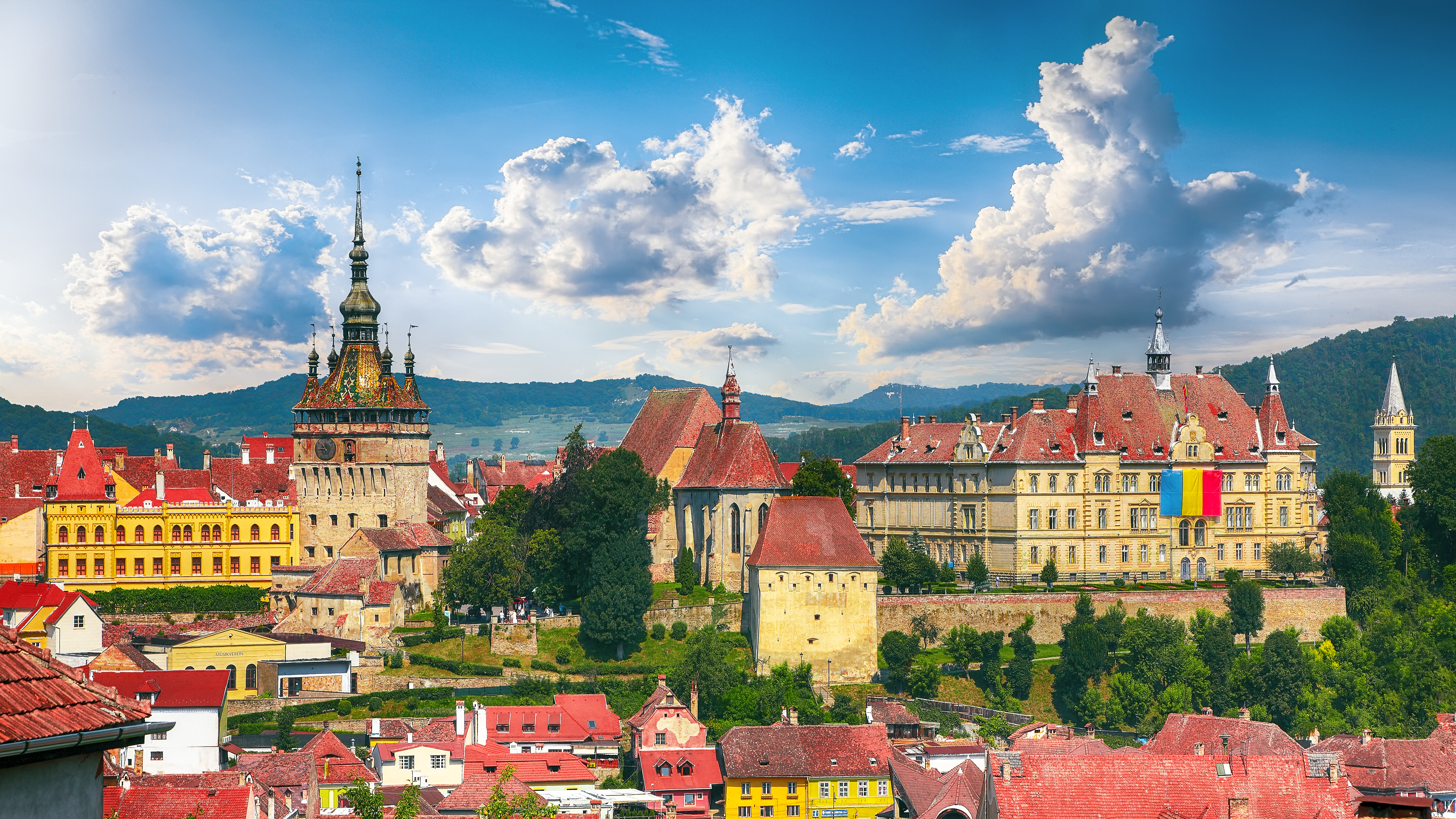 Panoramic summer view over the medieval cityscape architecture in Sighisoara town, historical region of Transylvania, Romania, Europe