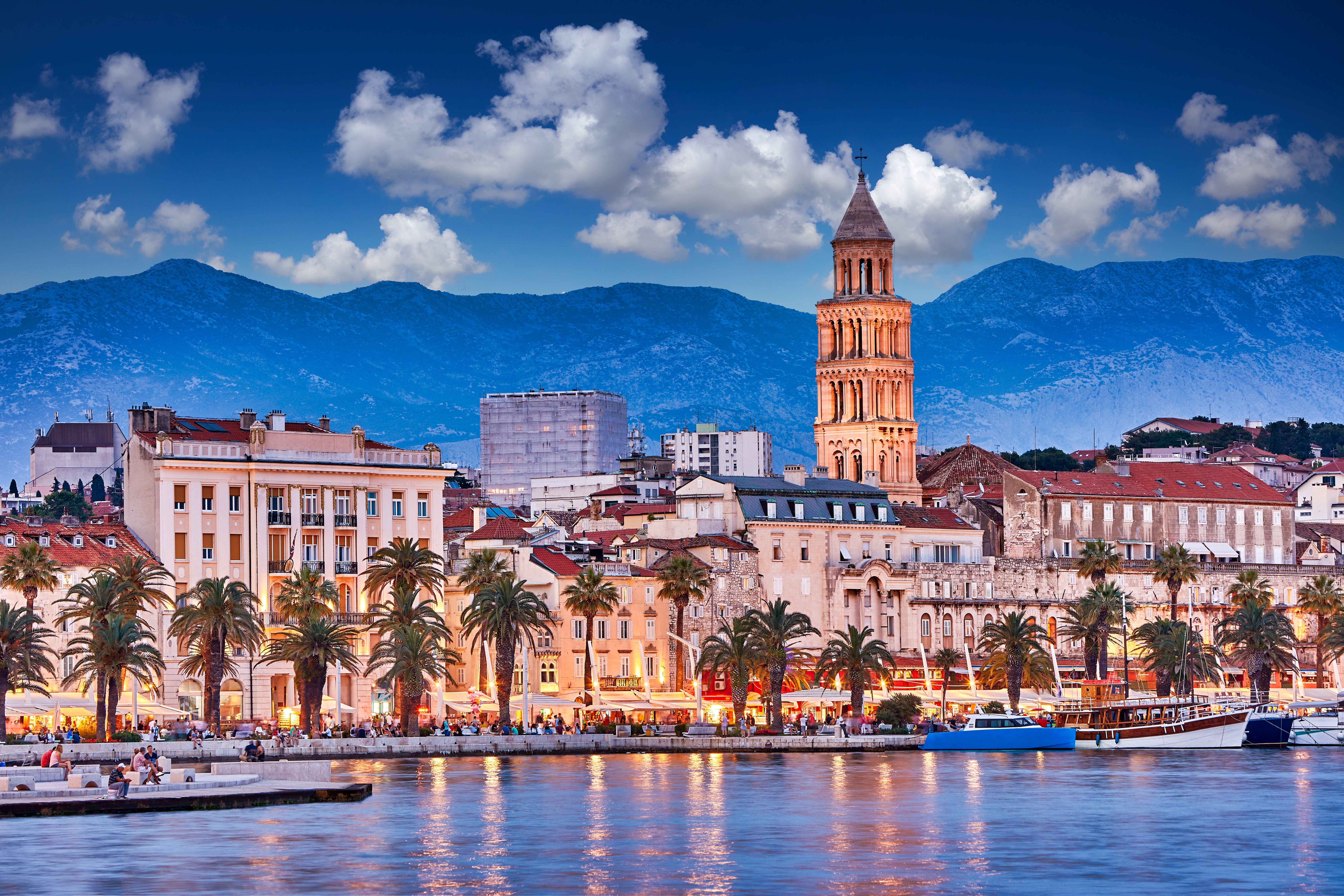 Split, Croatia. View of Split - the second largest city of Croatia at night. Shore of the Adriatic Sea and famous Palace of the Emperor Diocletian. Traveling concept background. Mediterranean countries.