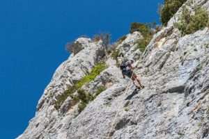 Climber rappelling along along the cliff, Gorges du Verdon, France